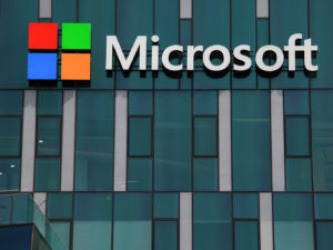Haifa, Israel - February 1, 2016: Microsoft logo and emblem. Microsoft is an international corporation that develops, supports and sells computer software and services worldwide.